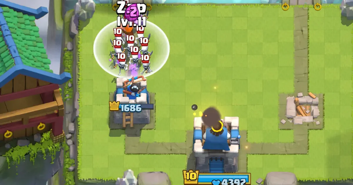Clash Royale arena battle with troops and towers